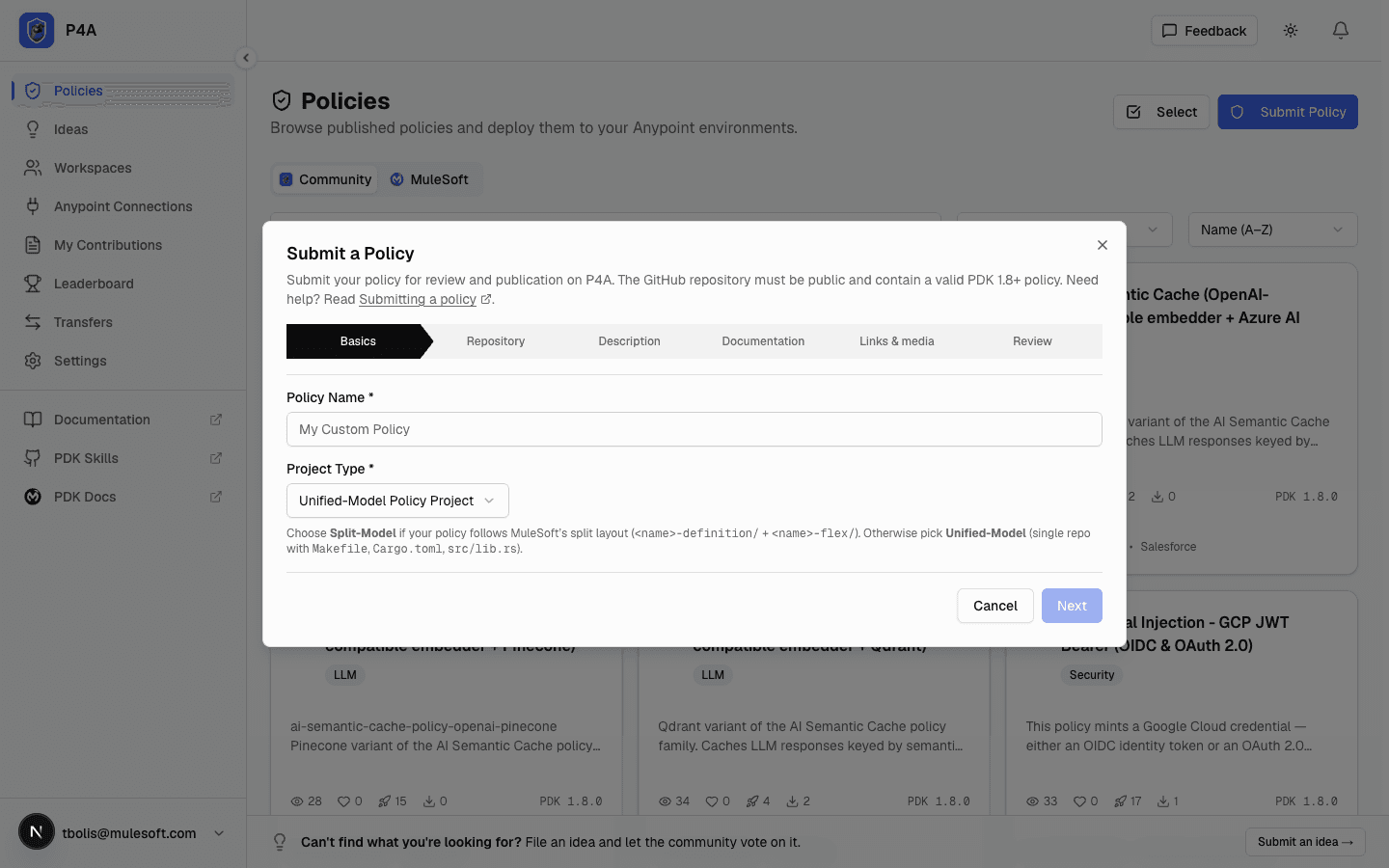 Submit a Policy wizard on the Repository step, with the project type and repository URL fields and a Validate button